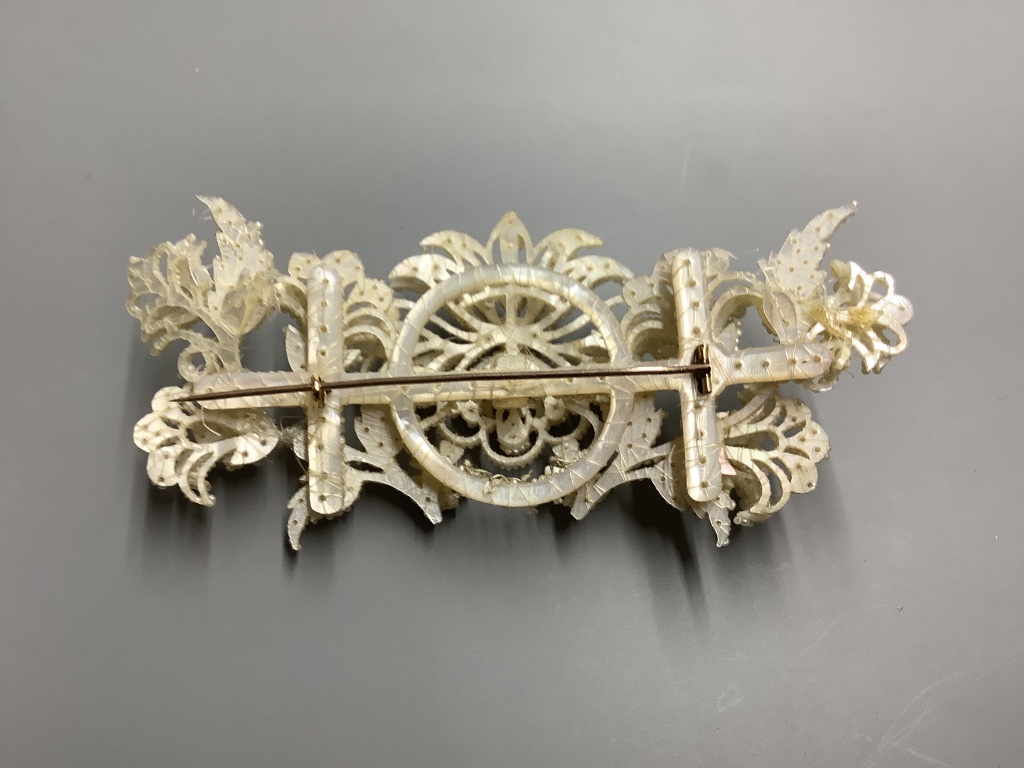 A 19th century seed pearl encrusted brooch, 10.8 cm.